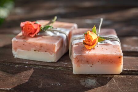 Healthy and natural rose soap wrapped in a stringの写真素材