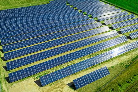 Solar Panels on green field in summer, aerial view, Polandの写真素材