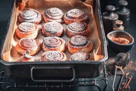 Delicious cinnamon rolls made of puff pastry for Christmasの写真素材