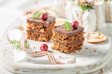 Closeup of Gingerbread cake for Christmas with small giftsの写真素材