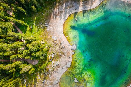 Top view of mountain lake Carezza, Dolomites, Italyの写真素材