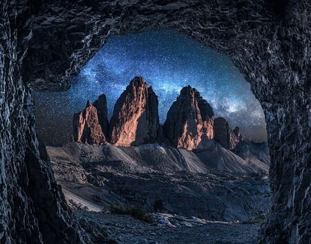 Stunning view to Tre Cime from cave at night, Dolomitesの写真素材