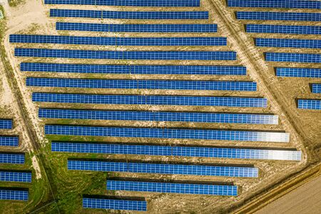 Amazing view of solar panels in sunny day, aerial viewの写真素材