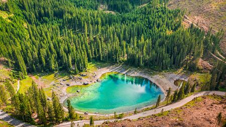 Aerial view of stunning Carezza lake in Dolomites, Italyの写真素材