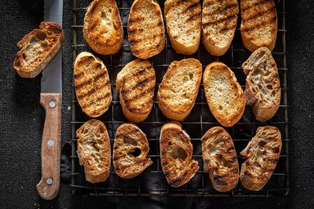 Rustic toasted wholegrain bread on a cooling sheet