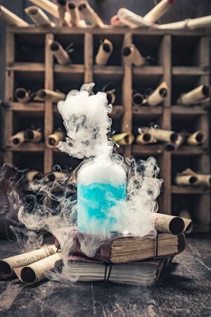 Magic research lab full of medieval and old scrollsの写真素材