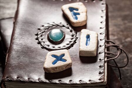 Original divination by rune stones based on futhark alphabet