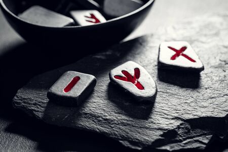 Old runic divination by stones based on futhark alphabet