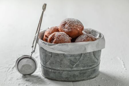Closeup of yummy and fresh donuts balls with powdered sugarの写真素材