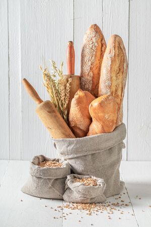 Crunchy french baguettes for breakfast in linen bagの写真素材