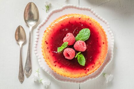 Yummy and sweet raspberry cheesecake made with fresh berriesの写真素材