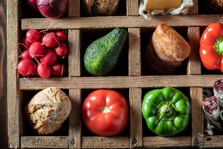 Closeup of ingredients for sandwich in old boxの写真素材