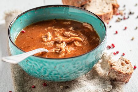 Spicy tripe soup seasoned with a mix of peppersの写真素材
