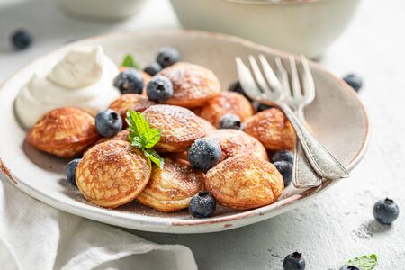 Yummy poffertjes for sweet and tasty breakfastの写真素材