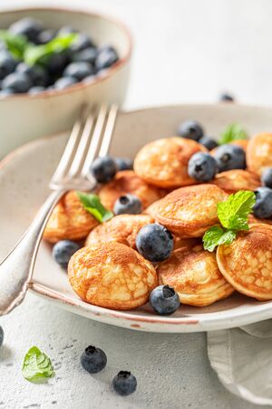Delicious mini pancakes for sweet and tasty breakfastの写真素材