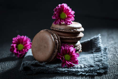 Sweet chocolate macaroons as a tasty small snack