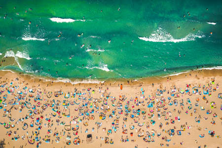 Crowded beach on Baltic Sea during pandemic, aerial view, Poland