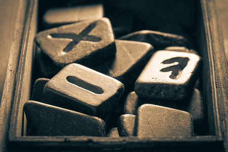 Unique rune stones using old Celtic language in old wooden box