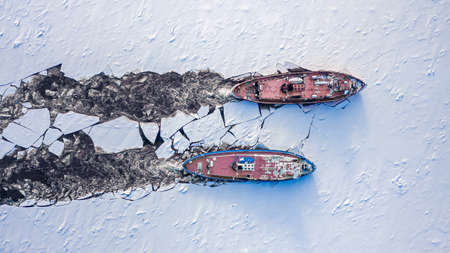Icebreakers on Vistula river crushes the ice, Poland, aerial viewの写真素材