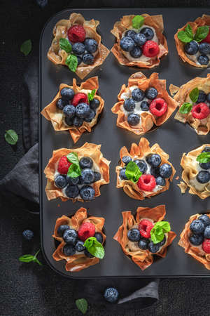 Delicious phyllo cups with blueberries and raspberries. Summer dessert. Kitchen of the Ottoman...