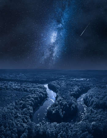 Milky way and river at night. Wildlife at night in Poland.の写真素材