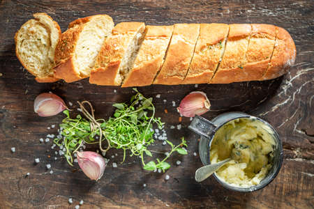 Delicious garlic bread with salt. Baguette with garlic. Italian cuisine.