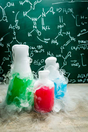 Old school laboratory with beakers chemical formula. Practical chemistry classes.の写真素材