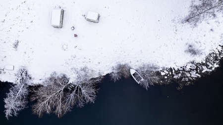 River and frozen forest. Aerial view of nature in Poland, Europeの写真素材