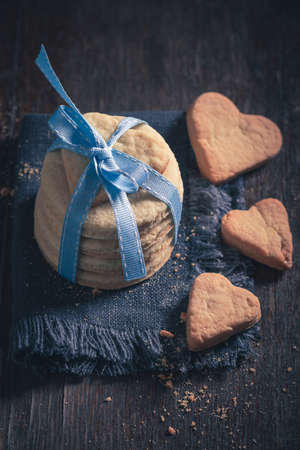 Cute valentine cookies as special snack for couples. Shortbread for valentine day in the shape of...