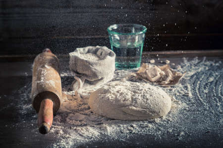 Homemade and tasty dough for baking tasty bread. Yeast dough made to rise in a warm place.の写真素材