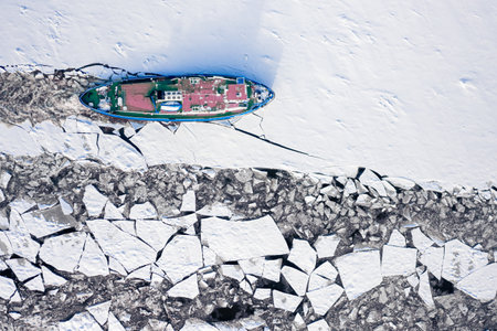 Icebreaker on Vistula river in winter, Plock, aerial view of Polandの写真素材
