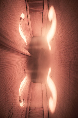 Wooden violin view from inside. Interior of violin. Macro view of a violin.の写真素材