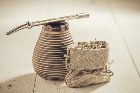 Tasty and aromatic yerba mate with calabash and bombilla. Yerba mate ready to brew.