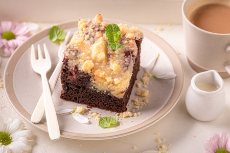Sweet yeast cake with icing and fruits.. Yeast cake with coffee.の写真素材
