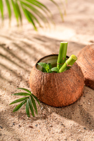 Aromatic coconut milk in shell perfect for hot days. Holidays on a paradise beach.の写真素材
