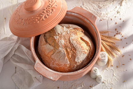 Homemade loaf of bread freshly baked in home bakery. Homemade bread.の写真素材