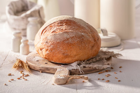Crispy round loaf bread in a home bakery. Homemade bread.