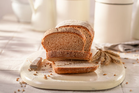 Small loaf of rye bread perfect for a balanced breakfast. Rustic loaves of bread.