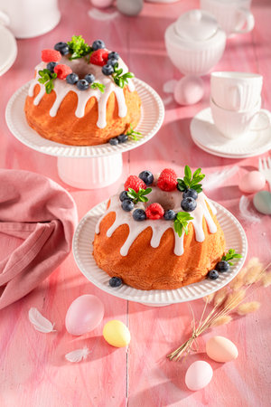 Sweet Easter ring cake with festive spirit decor. Easter cake with fruits.の写真素材
