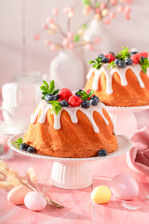 Sweet Easter ring cake baked in home oven. Easter treat and holiday decorations.の写真素材