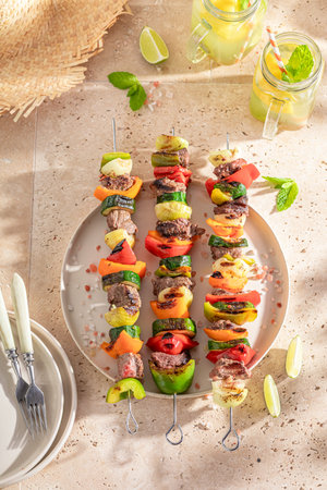 Tasty roasted skewer as healthy summer appetizer. Summer grilled shashlik with meat.の写真素材