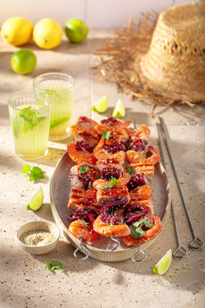 Fresh roasted skewer as a healthy summer appetizer. Roasted shashlik seasoning with spices.の写真素材
