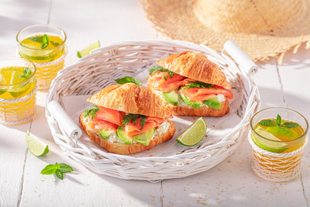 Healthy and homemade french croissant with fish and avocado. Croissants with spring and ingredients.の写真素材