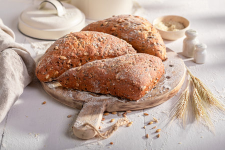 Tasty and brown triangular buns for perfect and healthy breakfast. Triangular buns baked in a...