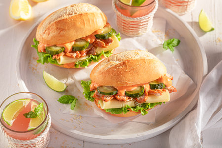 Tasty and spicy sandwich made with fresh ingredients and chicken. Sandwich with gyros chicken and cheese.の写真素材