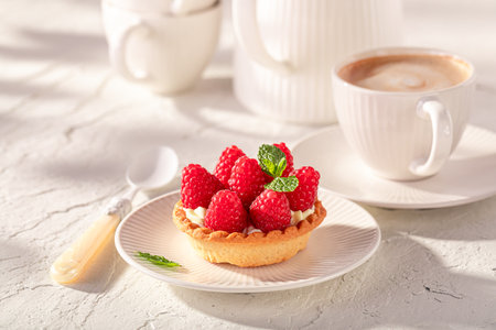 Sweet and delicious mini tart made of local ingredients and raspberries. Cake with raspberries and cream.の写真素材