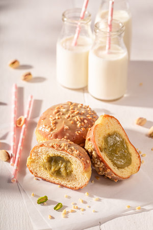 Delicious and yummy pistachio donuts as a lunch snack. Best tastes with milk. Most popular dessert.の写真素材