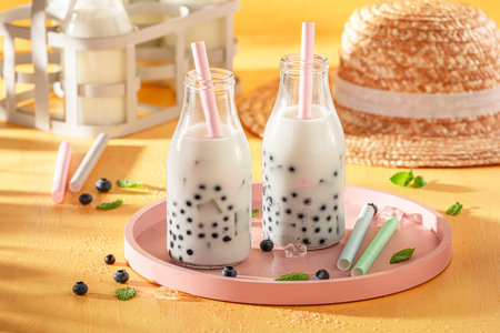 Refreshment blueberry bubble tea with milkshake, balls and ice. Summer milky drink.の写真素材