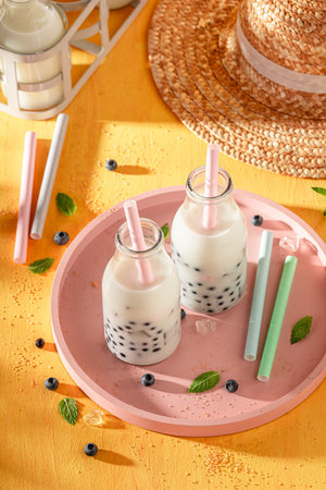Homemade blueberry bubble tea made of milk, berries and pearls. Bubble tea with fresh berries.の写真素材