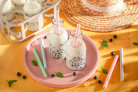 Homemade blueberry bubble tea made of kefir and forest fruits. Chilled drink for hot days.の写真素材